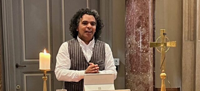 Edson Dorneles, a man speaking in church