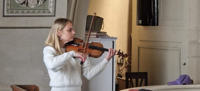 violinist in church balcony